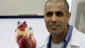 Professor Tal Dvir speaks during their interview with Reuters on his team's development of a 3D printed patch comprised of lab-grown heart tissue and nano-electronics that could potentially revolutionize the treatment of heart disease, at a laboratory in Tel Aviv University March 16, 2016. Picture taken March 16, 2016. REUTERS/ Nir Elias - RTSCT4X