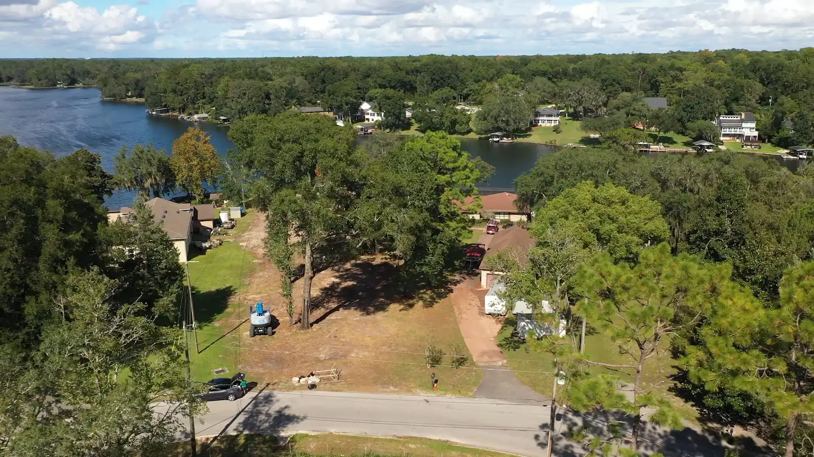 Aerial view of land clearing and large tree cutting documentation